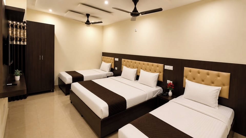 Family Room | Desk, WiFi (free), bed sheets