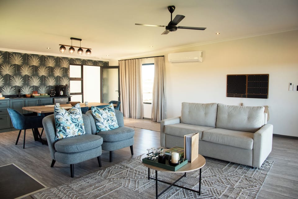 Waterside Family Suite | Living area | Fireplace