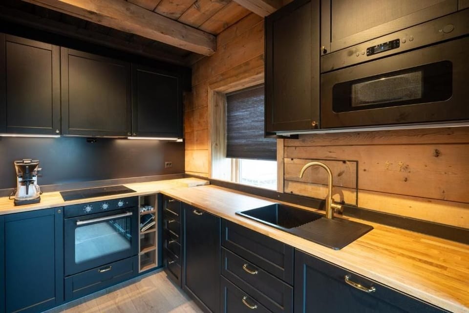 Premium Cottage, Resort View | Private kitchen | Highchair