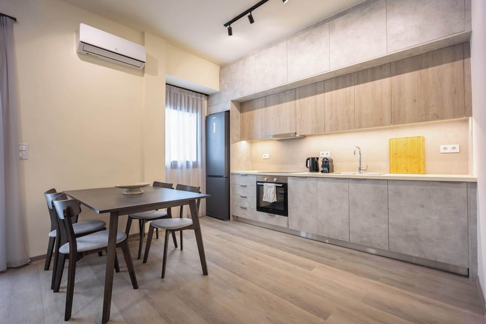 Cook breakfast or share takeout here, with design making longer stays feel easy and homey.