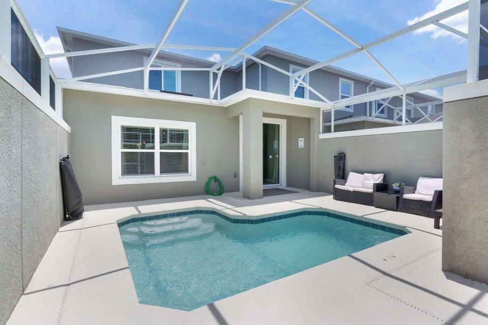 Step outside to your private screened pool and enjoy easy, relaxing Florida days right at home.