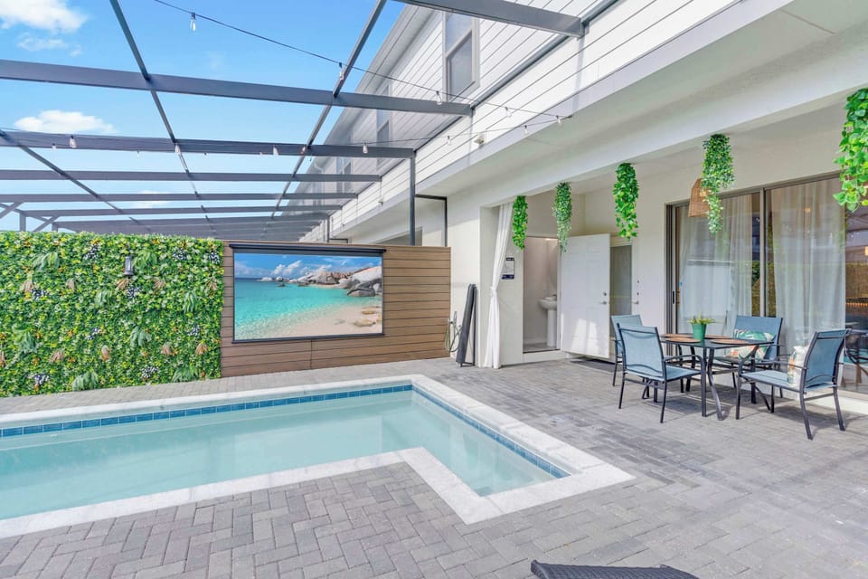 Your private screened deck: soak up the sun and enjoy the pool free from bugs and full of privacy.