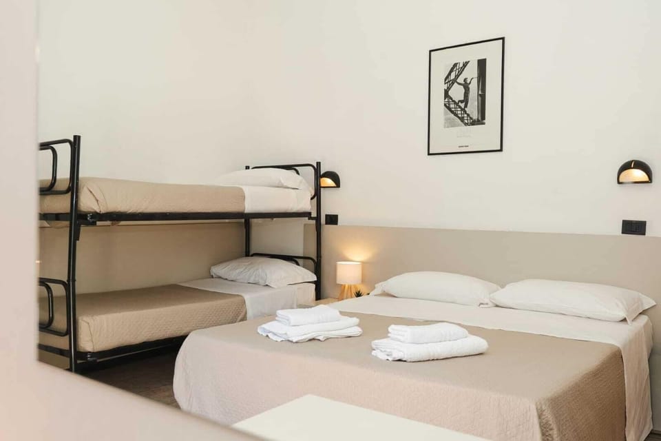 Classic Quadruple Room, Balcony | In-room safe, desk, blackout drapes, soundproofing