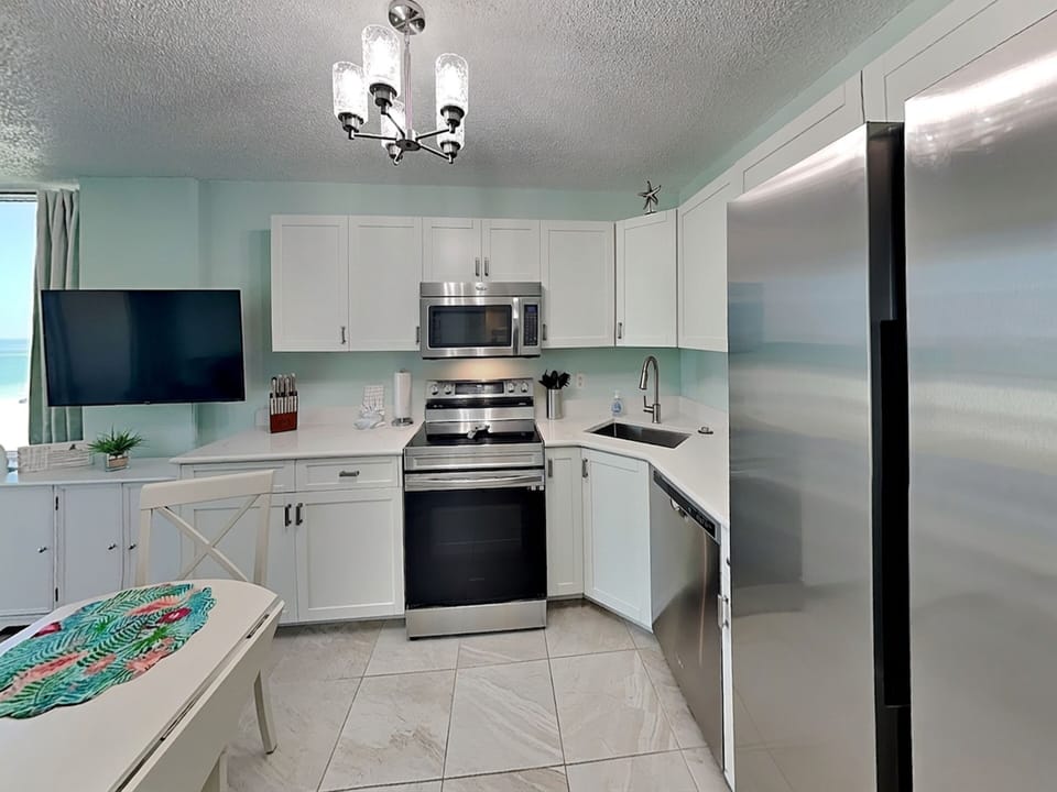 Fully Equipped Kitchen with Stainless Steel Appliances
