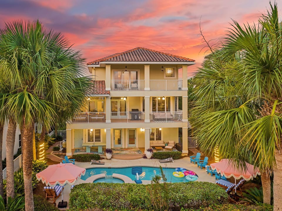 Welcome to Sunburst Villa—three stories of beautifully designed spaces, all centered around your own private tropical oasis. 🌴✨