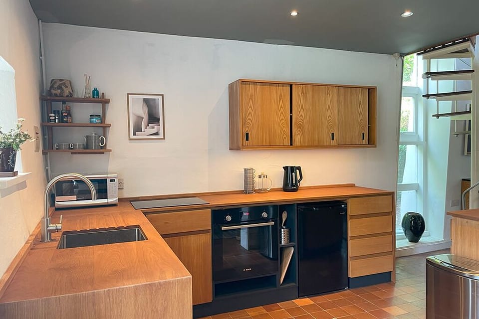 Hand-crafted kitchen, including Bosch hob, oven and microwave.