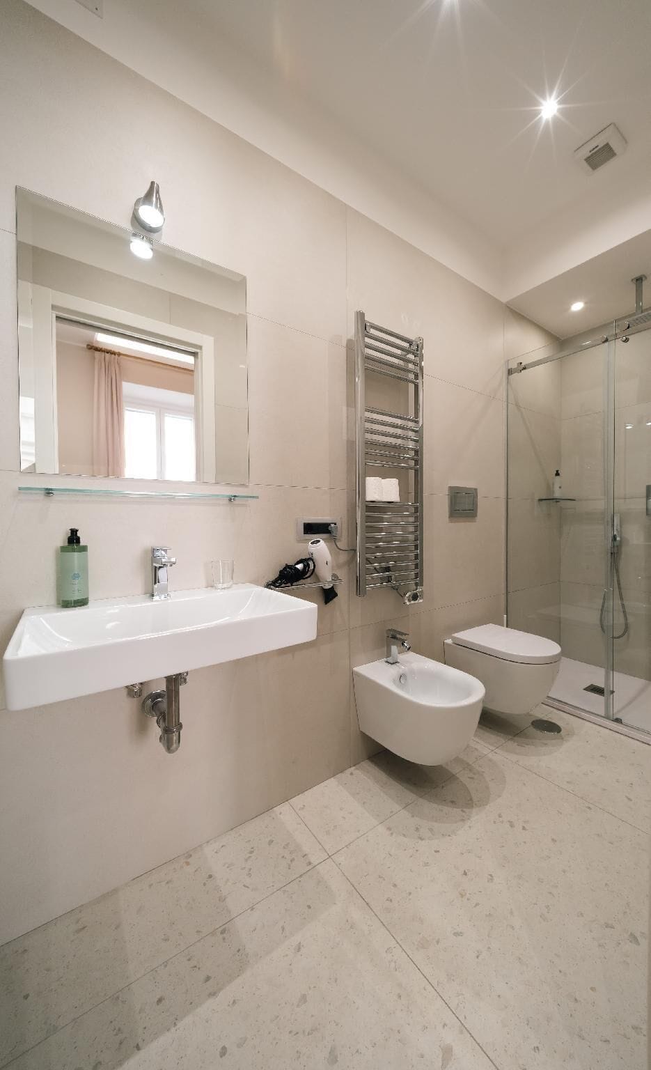Shower, rainfall showerhead, eco-friendly toiletries, hair dryer