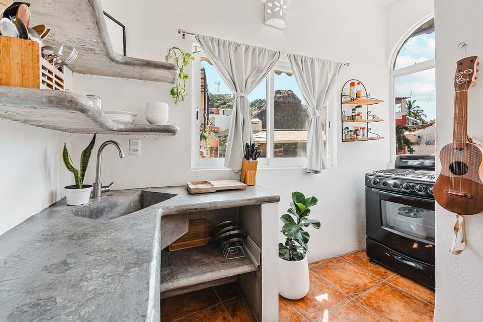 Apartment, City View, Courtyard Area | Private kitchen | Highchair