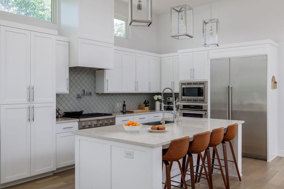 Gather around the spacious kitchen island, perfect for morning coffee, casual dining, or entertaining family and friends.