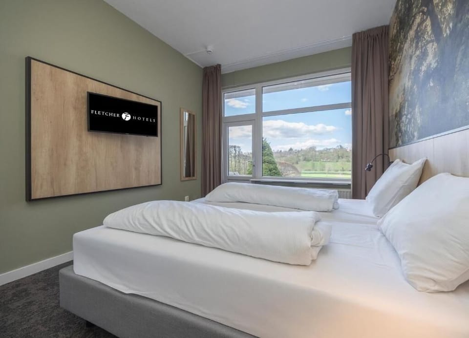 Wake up to soft light and sweeping countryside views.