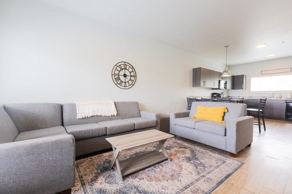 Spacious living room with a TV, offering a comfortable place to gather, relax, and enjoy some downtime.