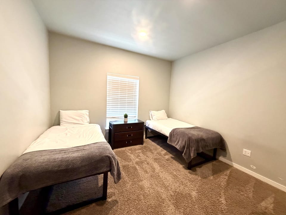Bedroom featuring two twin beds 