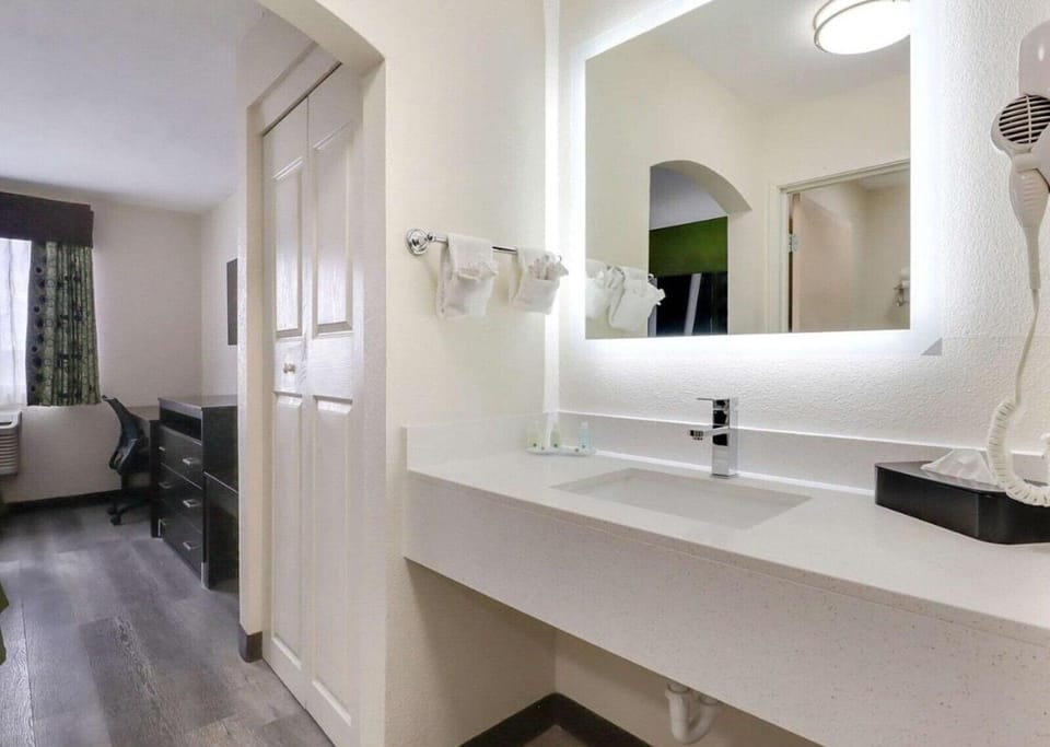 Suite, 2 Queen Beds, Non Smoking | In-room safe, desk, iron/ironing board, WiFi (free)