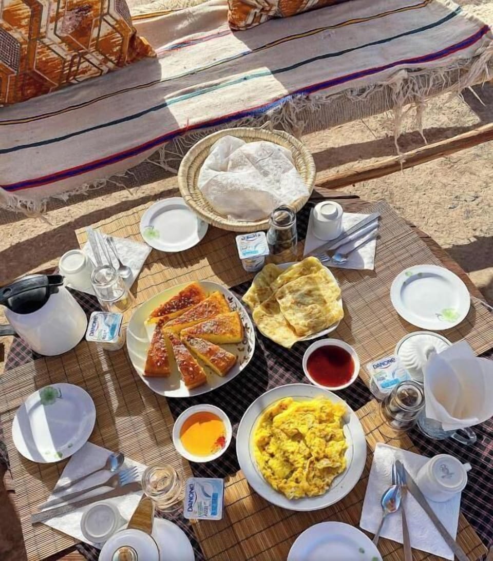 Deluxe Room, Garden View | Breakfast meal | Free daily local cuisine breakfast