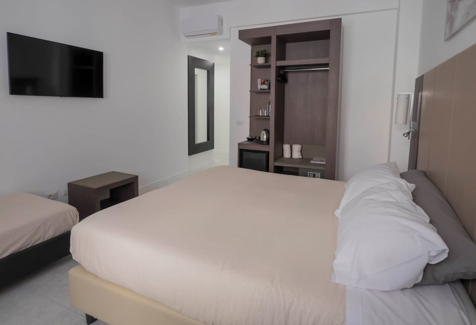 Egyptian cotton sheets, premium bedding, down comforters, in-room safe