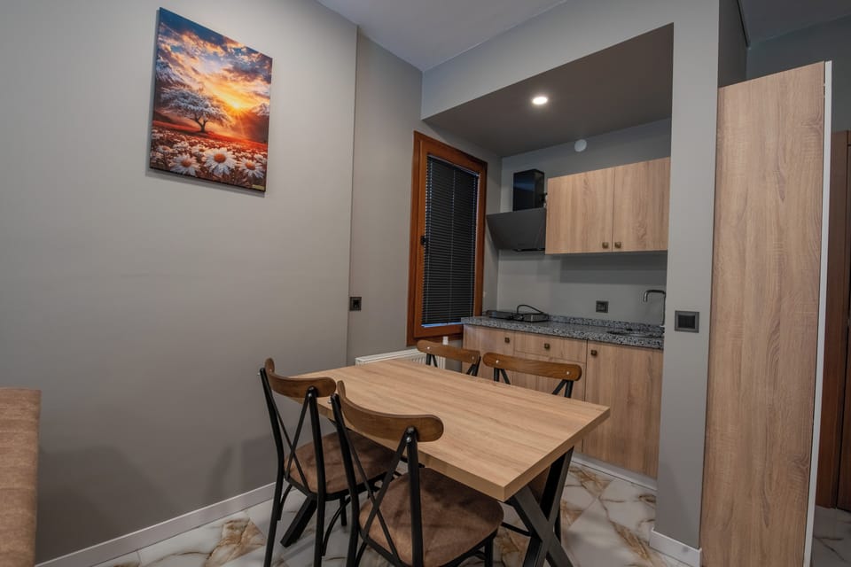 Deluxe Room, River View | Private kitchenette | Mini-fridge
