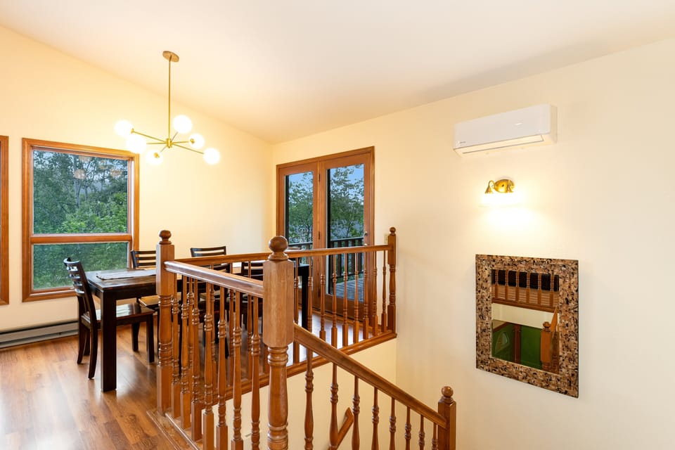 Stairway to lower level bedrooms | Interior