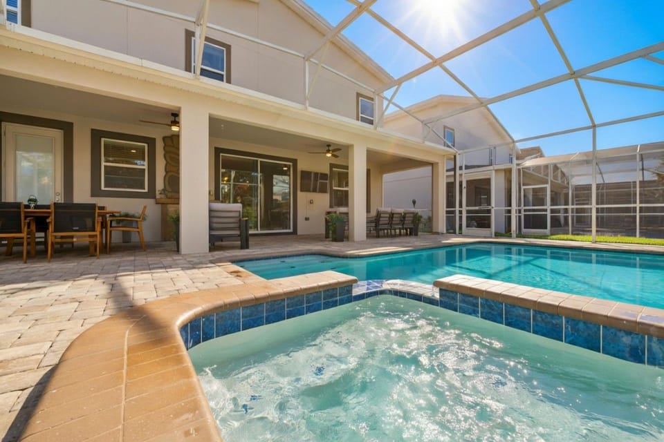 Private screened pool and spillover spa. Optional heat is extra.