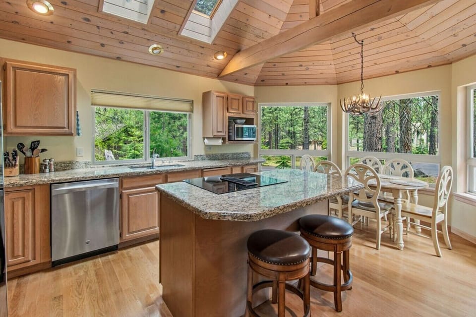 The open kitchen keeps everyone connected while meals and memories are made together.