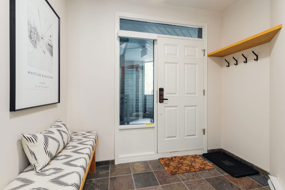 Entryway - Bench seating, coat hooks — drop your gear and settle in