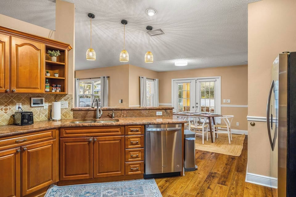 Kitchen island with bar seating and generous space for meal prep.