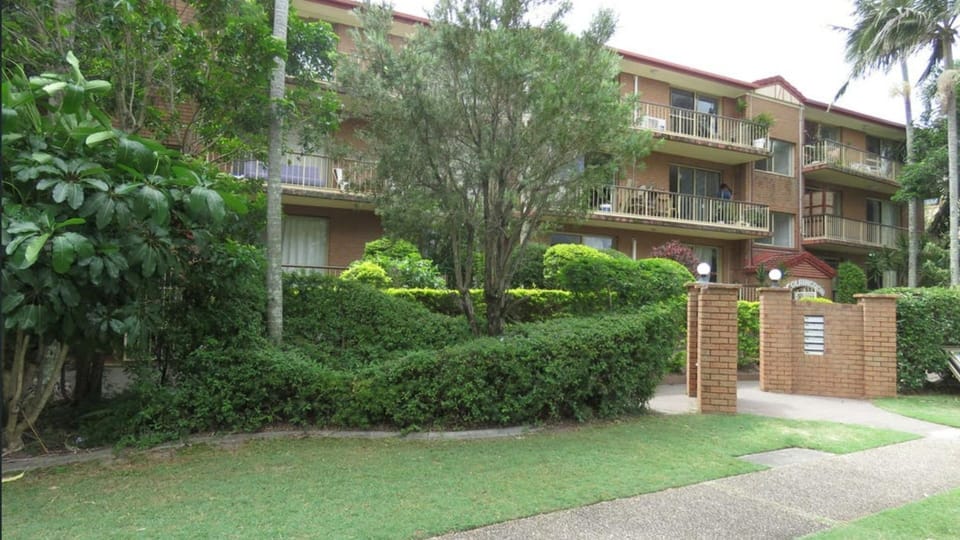 The apartment is nestled within a peaceful, well-maintained complex offering a relaxed coastal lifestyle.