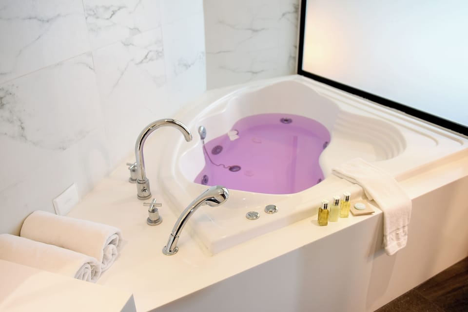Premium Suite, Balcony | Bathroom | Separate tub and shower, hair dryer, bidet, towels