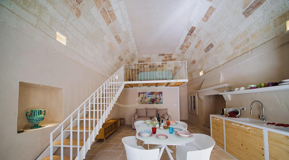 Apartment (1 Bedroom) | Living area | 32-inch Smart TV with cable channels