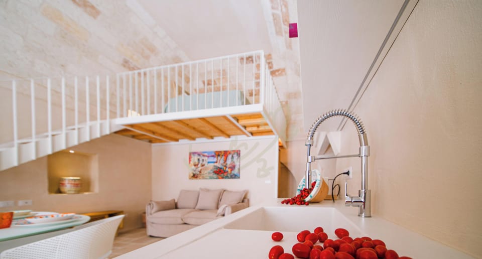 Apartment (1 Bedroom) | Living area | 32-inch Smart TV with cable channels