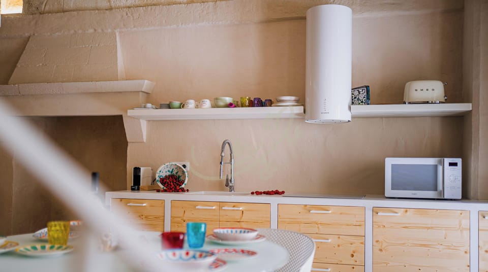 Apartment (1 Bedroom) | Living area | 32-inch Smart TV with cable channels