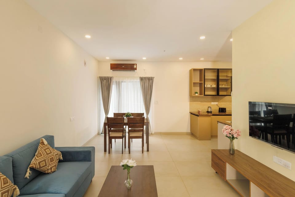 Apartment (1 Bedroom) | Living area | 66-inch TV with digital channels