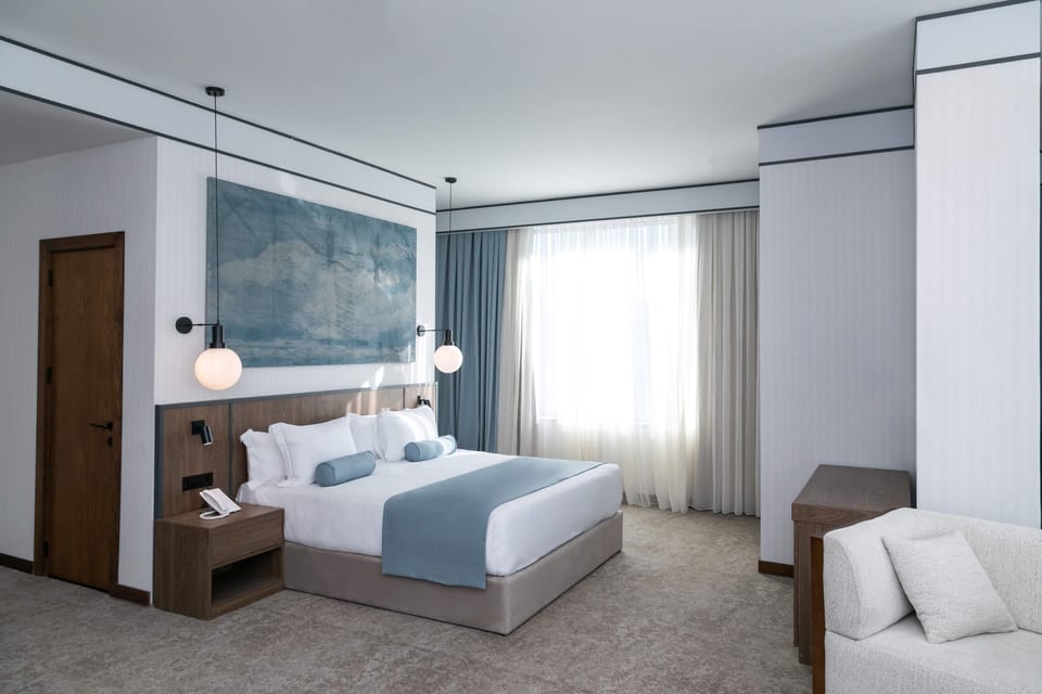 Deluxe Double Room, City View | In-room safe, blackout drapes, soundproofing, iron/ironing board