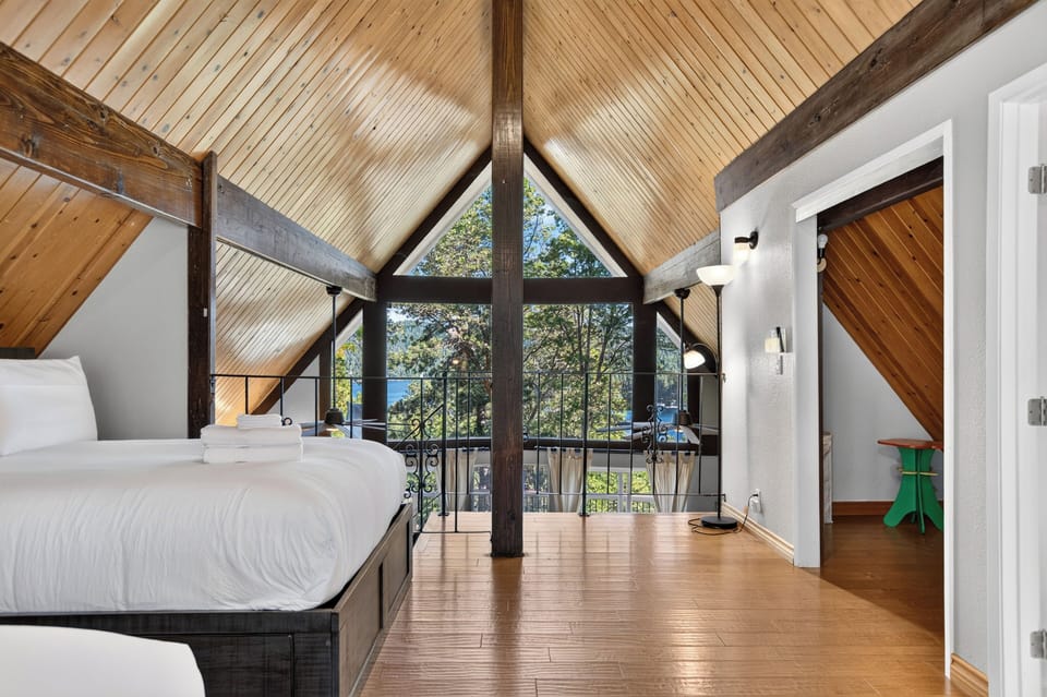 Loft sleeping area looking out over the upper deck.