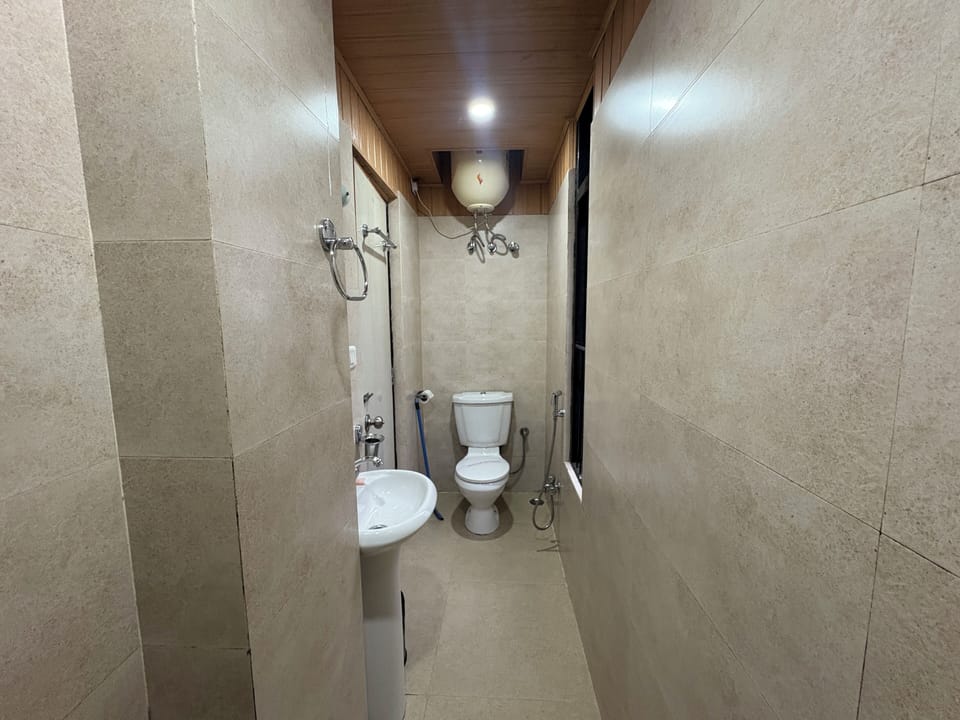 Standard Double Room, City View | Bathroom | Shower, free toiletries, towels
