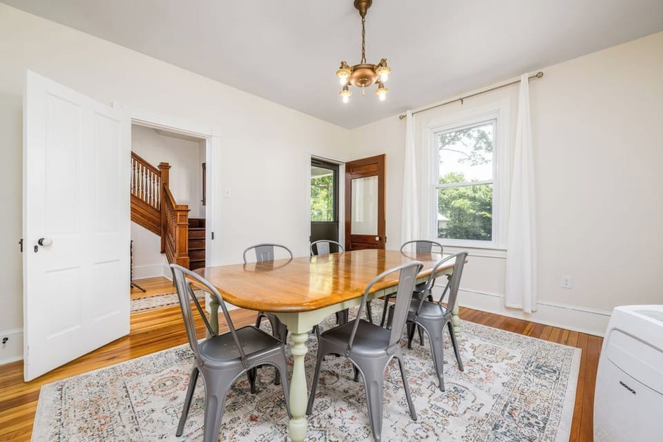 Dining area with its own exterior door for access to the front wrap around porch