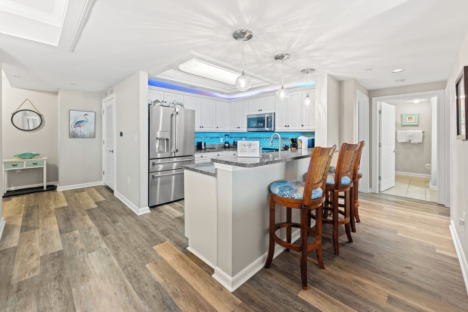 Breakfast bar off kitchen with more seating