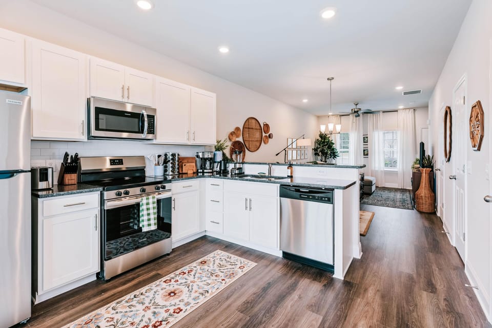 Cook, dine, and unwind in this bright open-concept main floor.