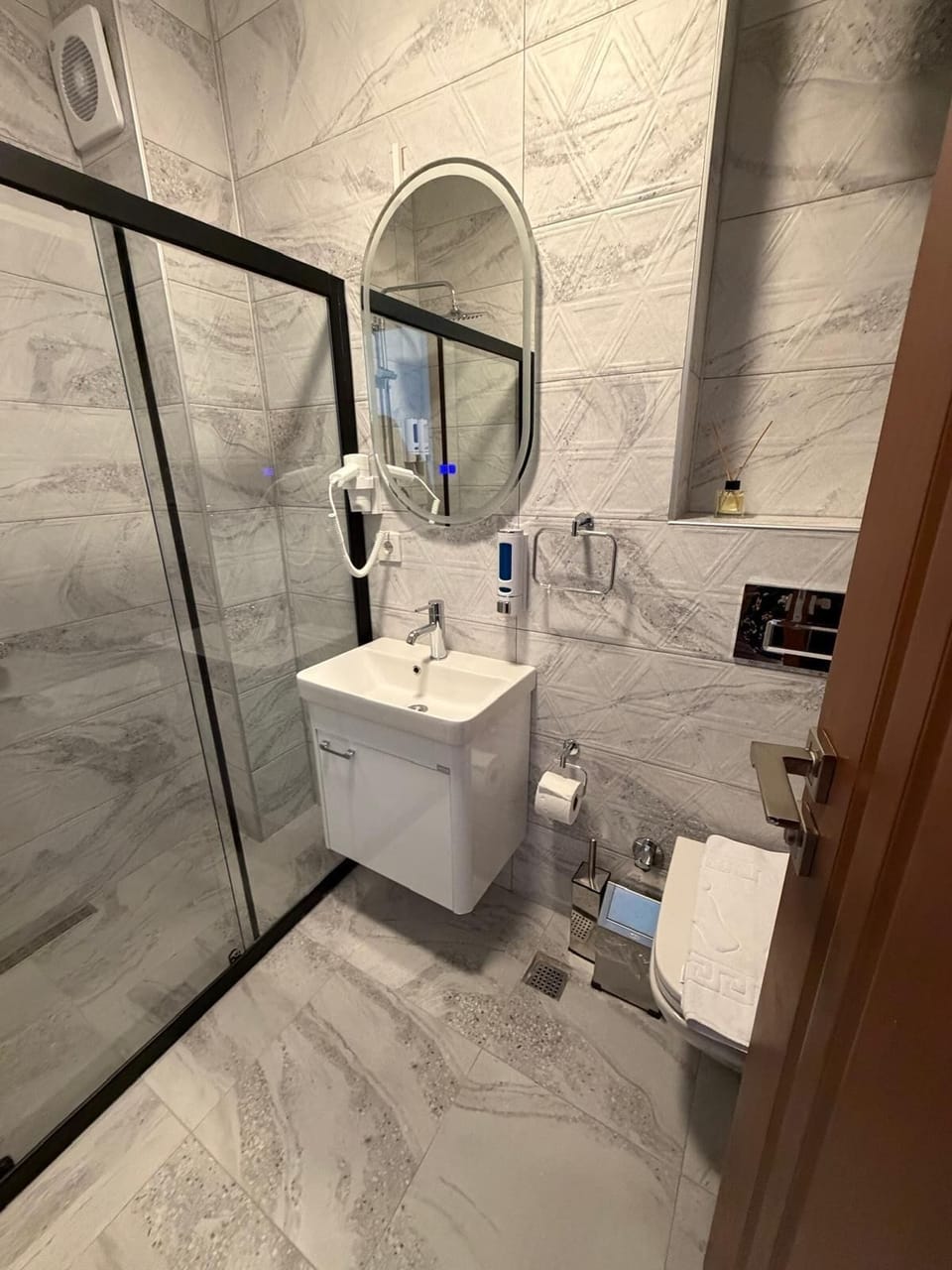 Bathroom | Shower, hair dryer, towels, soap