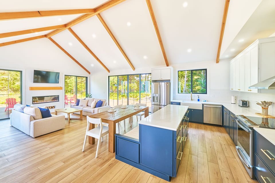 Chef's Dream Kitchen – New appliances, a spacious island, and open dining.