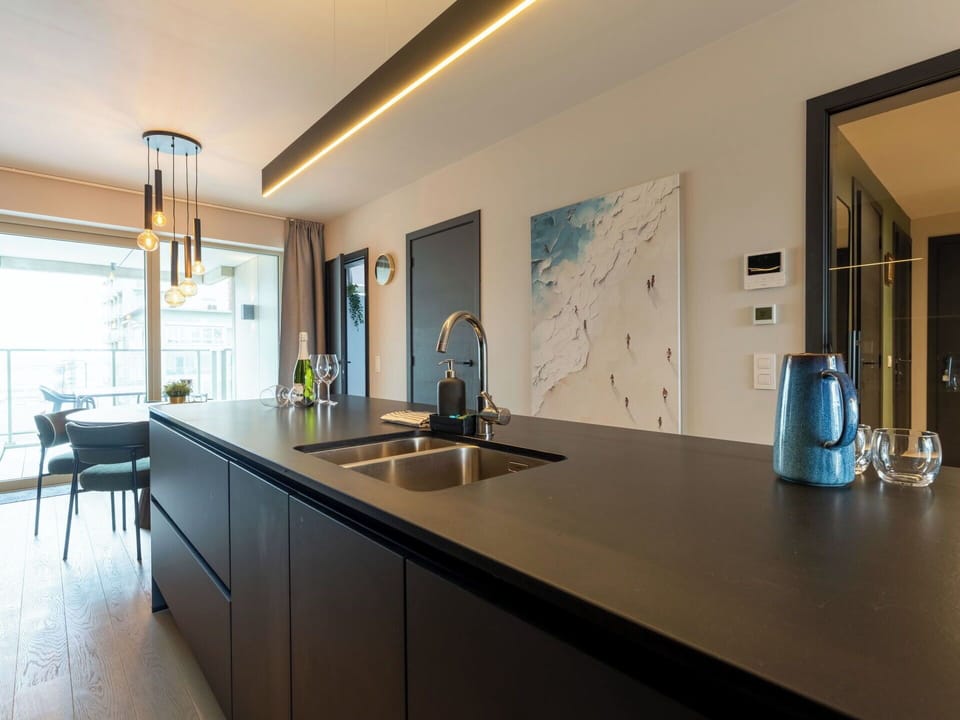 Interior Design, Countertop, Kitchen, Ceiling, Light Fixture, Flooring, Lighting, Cabinetry, Tap, Home