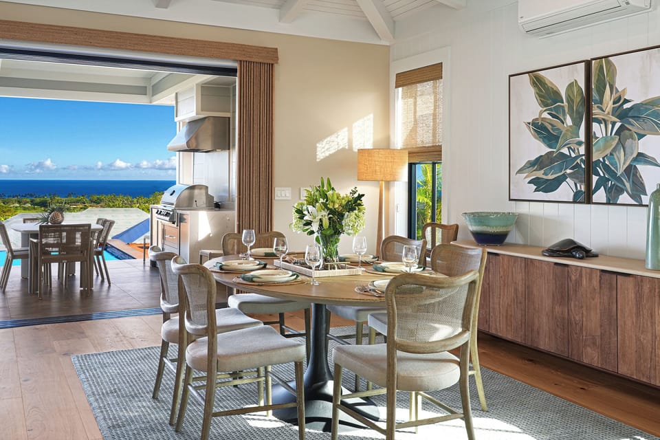 Pull up a chair at a table set against the glass, ocean on the horizon past your morning coffee.