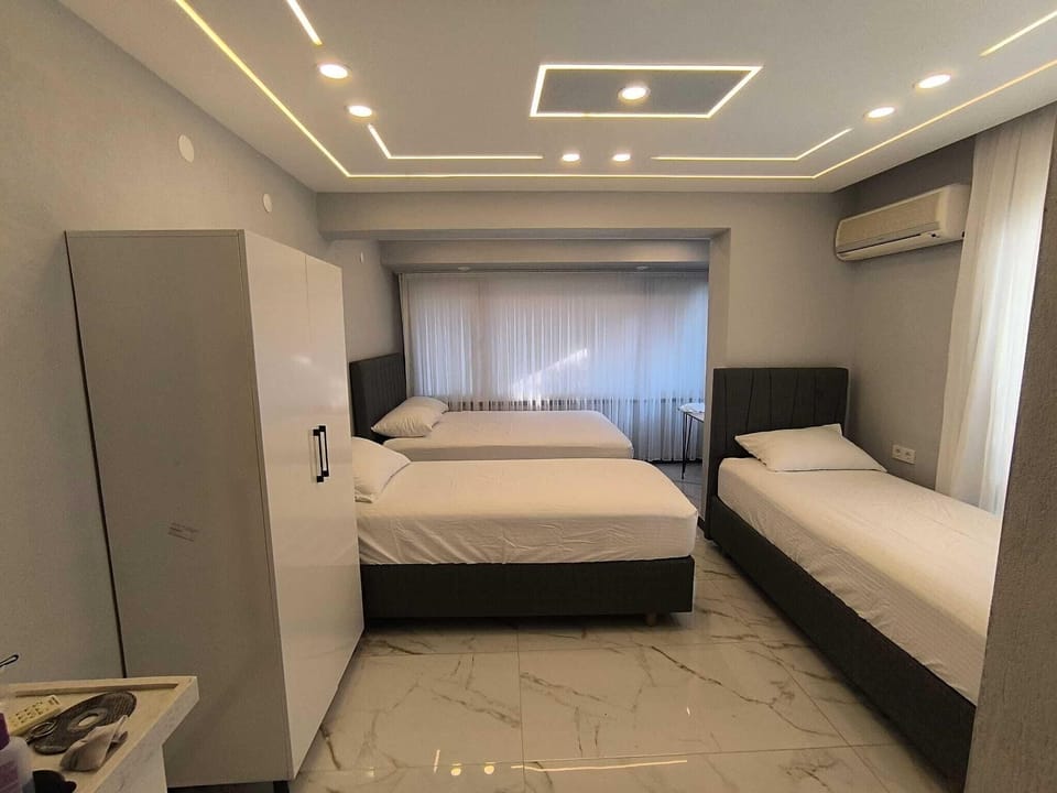 Luxury Room, Multiple Beds, Balcony, Garden View | Desk, laptop workspace