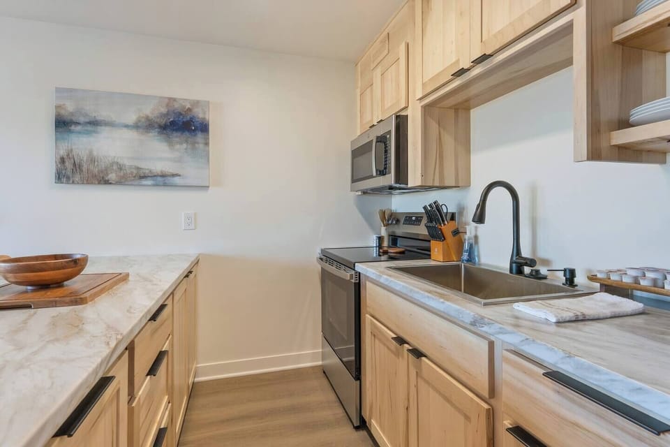 A fully equipped kitchen with everything you need for meals, snacks, or morning coffee.