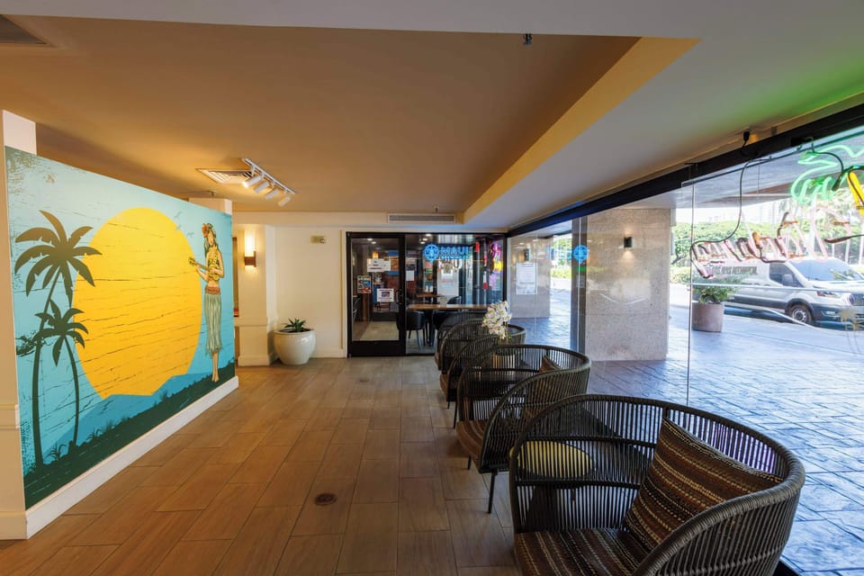 ✨ Enjoy the building's thoughtfully designed common areas, featuring comfortable seating and a warm island-inspired atmosphere.