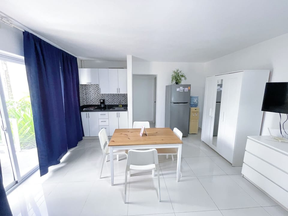 Deluxe Studio, 2 Queen Beds, Pool View | Private kitchenette | Coffee/tea maker, fridge, microwave (on request), stovetop