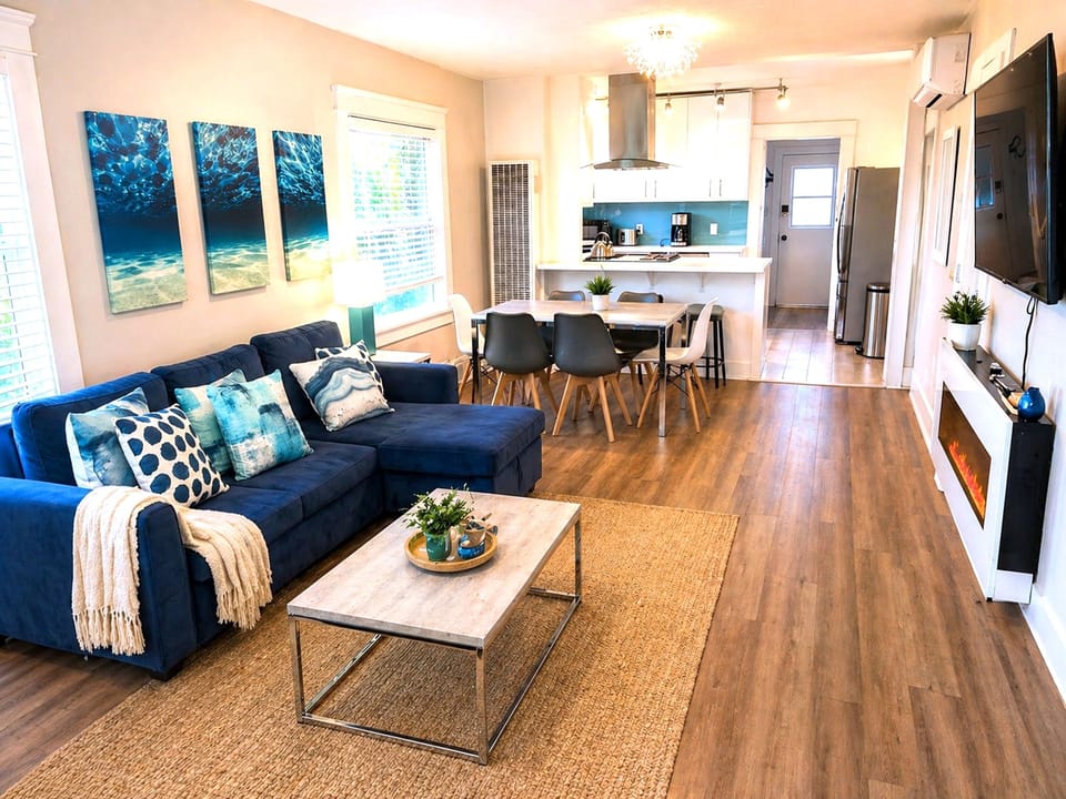 Bright coastal-style living area with open kitchen and dining space