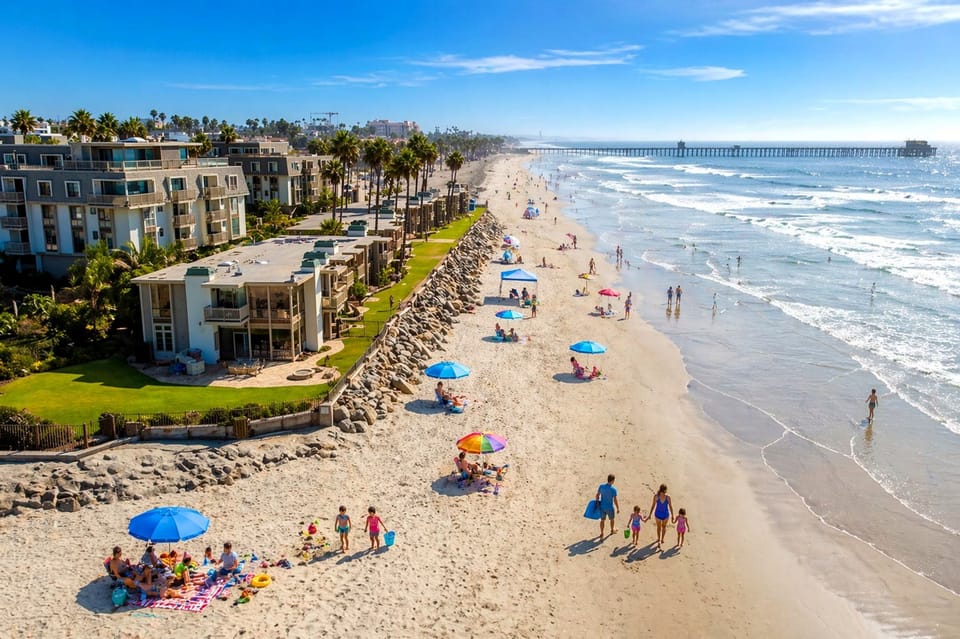 Oceanfront stay steps to the sand, surf, and pier—family-friendly fun.