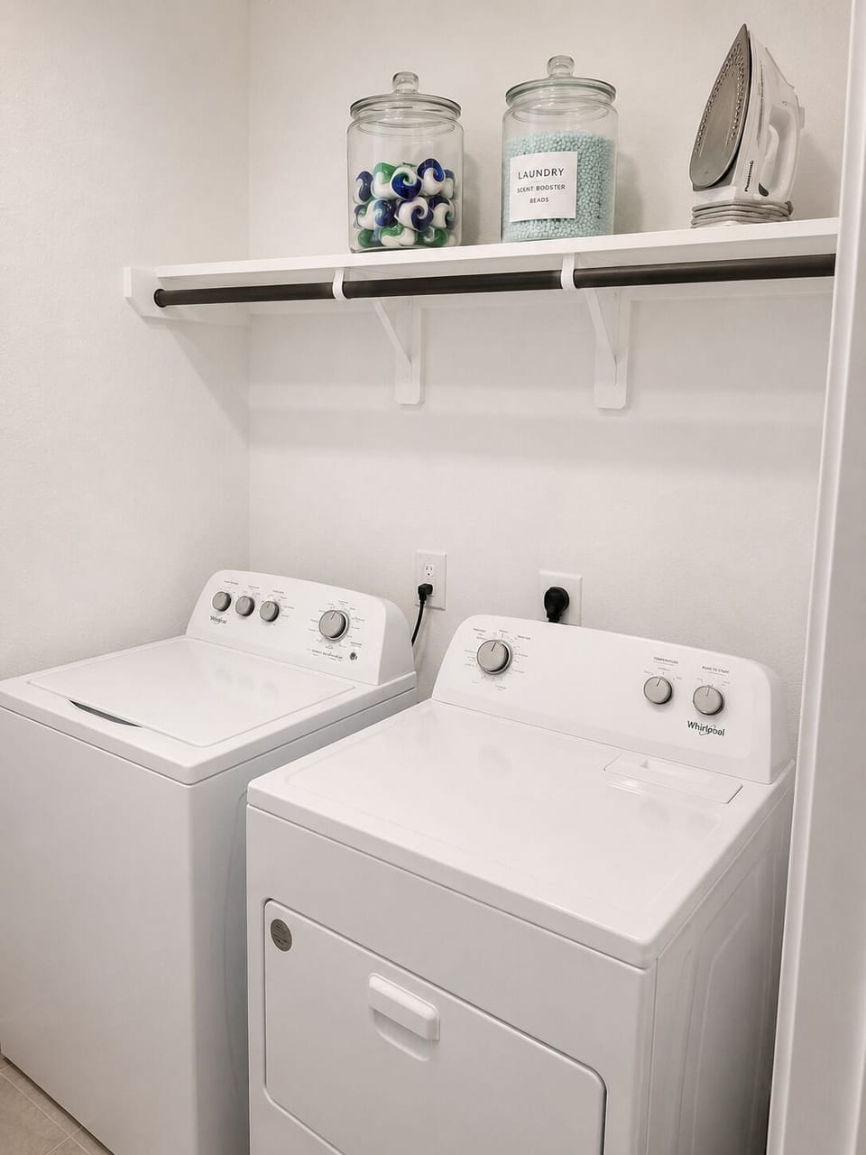 Laundry room full size washer and dryer with provided scent beads and detergent 