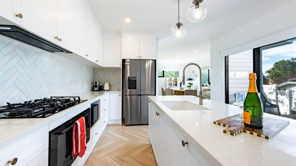 Wake up to beautiful natural light in the spacious master bedroom with balcony access.