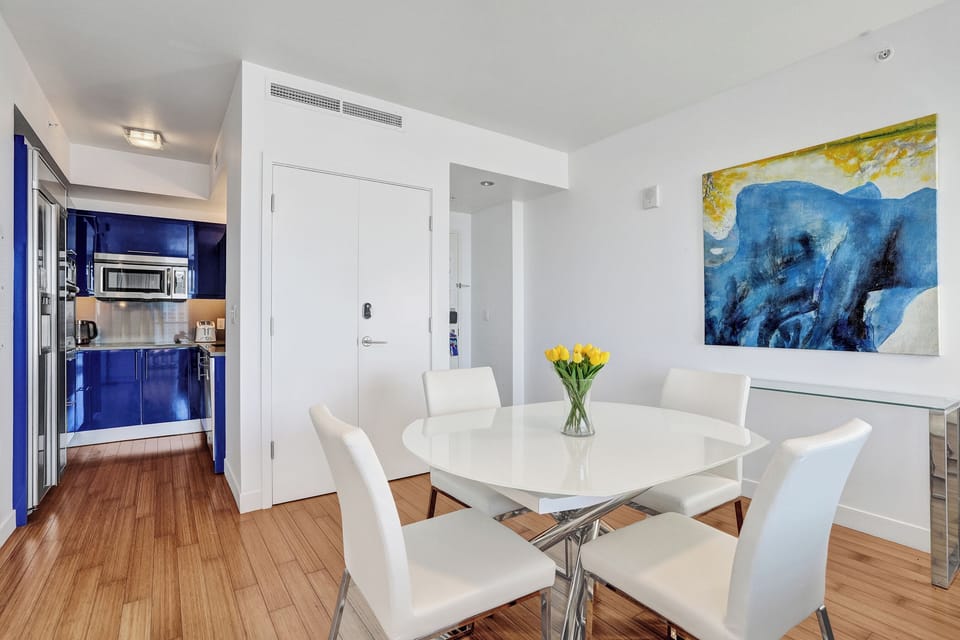 Thoughtful layout with the sleek kitchen just off the entry and dining area close by.